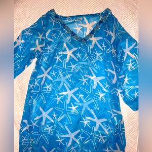 tropical beach cover up. Sheer teal & white, beading at neckline and wrists.